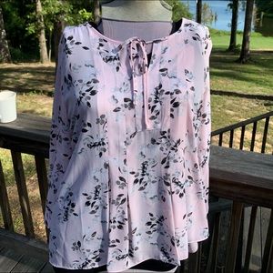 Soft pink blouse with black and grey print.